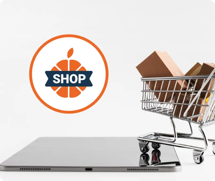 Shopping cart with packages on top of a mobile phone representing digital sales on DM Shop.