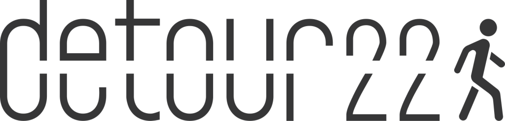 Full detour22 logo showing stylized typography with crosswalk cutouts and a walking human icon.